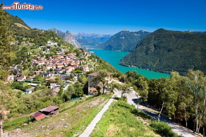Immagine Lugano, Canton Ticino: il panorama del lago visto dal Monte San Salvatore, in Svizzera - © gevision / Shutterstock.com