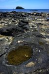 Andilana beach: un tratto di costa rocciosa, durante la fase di bassa marea, a Nosy Be in Madagascar - © lkpro / Shutterstock.com