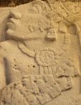 Dettaglio da un bassorilievo a Palenque (Chiapas, Messico) che raffigura un prigioniero Maya - © Dave Rock / Shutterstock.com