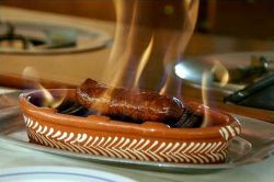 Il chouriço, il piatto tipico di Lisbona, una salsiccia cotta alla fiamma - foto © www.cm-lisboa.pt