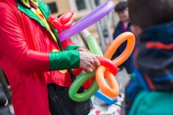 Clown in strada per festeggiare il carnevale a Finale Ligure (Savona)