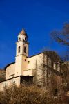 La chiesa del villaggio di Triora, Imperia, Liguria, fotografata in una giornata con il cielo blu e terso - © Paolo Trovo / Shutterstock.com
