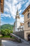 La Chiesa di S.Daniele Profeta a Paluzza. Siamo in provincia di Udine in Friuli-Venezia Giulia. - © milosk50 / Shutterstock.com