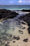 Rocce sulla spiaggia di Belle Mare, Mauritius - Le acque cristalline dell'Oceano Indiano si infrangono su questo tratto di costa rocciosa di Belle Mare Beach: le tonalità verdi, azzurre ...