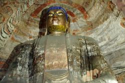 Statua del Buddha nelle grotte di Yungang a Datong, provincia di Shanxi, Cina.

