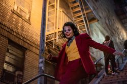 Un fan di Joker sulla scalinata del Bronx resa celebre dal fil sul personaggio di Batman - © Creative Family / Shutterstock.com