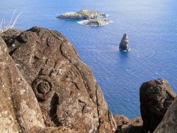 Un uomo con ali scolpito su una roccia dell'isola di Pasqua, Cile - © 59476237 / Shutterstock.com