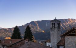 Uno scorcio del campanile di Rango, Trentino Alto Adige, in autunno.