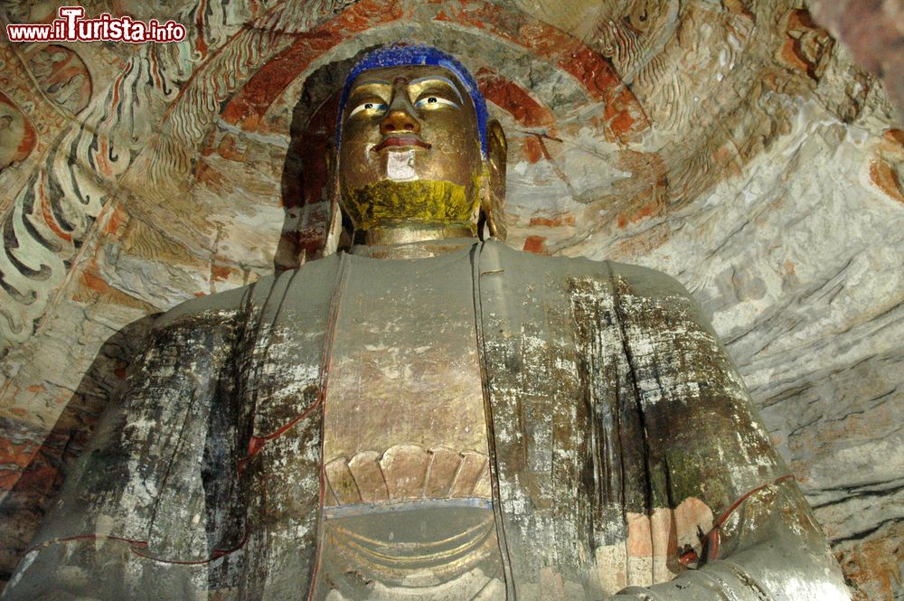 Immagine Statua del Buddha nelle grotte di Yungang a Datong, provincia di Shanxi, Cina.