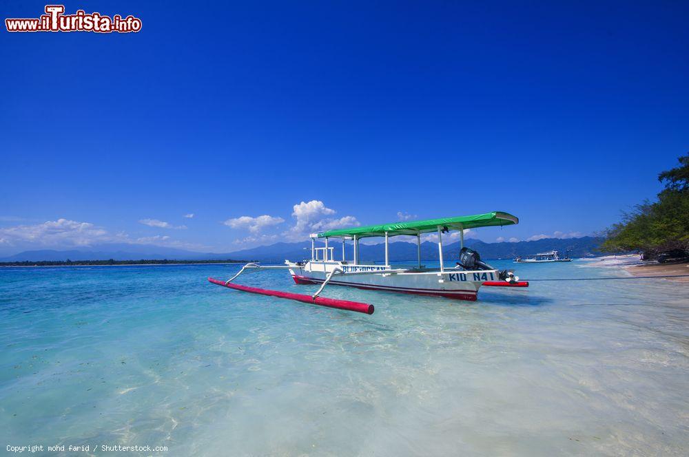 Immagine Un'imbarcazione per il trasporto dei turisti a Gili Trawangan in Indonesia - © mohd farid / Shutterstock.com