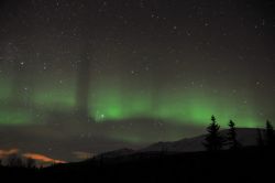 Bande luminose e scure, vengono disegnate in cielo dall'Aurora Boreale. Ci troviamo non distante da Tromso, nel nord della Norvegia
