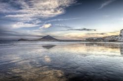 Tramonto a Playa El Médano (Tenerife, isole Canarie). Questa spiaggia si trova all'estremità meridionale dell'Isola di Tenerife, all'inizio della cosiddetta Costa del ...