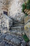 Un particolare della scala in pietra per accedere alla torre di San Giovanni di Sinis, Sardegna.



