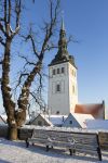 Torre campanaria di San Nicola a Tallin, fotografata in inverno dopo una nevicata - © Cloud Mine Amsterdam / Shutterstock.com