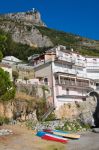 La spiaggia di Maratea e in alto il Cristo Redentore sul Monte San Biagio in Basilicata