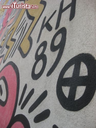 Immagine La firma di Keith Haring sul murale Tuttomondo che si trova a fianco della chiesa di San Antonio a Pisa