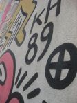 La firma di Keith Haring sul murale Tuttomondo che si trova a fianco della chiesa di San Antonio a Pisa