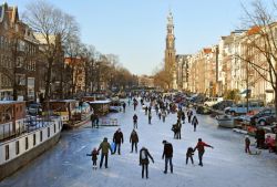 Pattinaggio ghiaccio canale Prinsengrach amsterdam Westerkerk - © oversnap / iStockphoto LP.