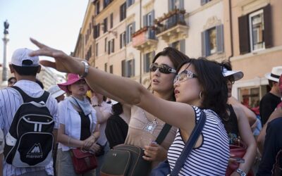 Two japanese tourists visiting in Piazza Spagna Rome, Italy